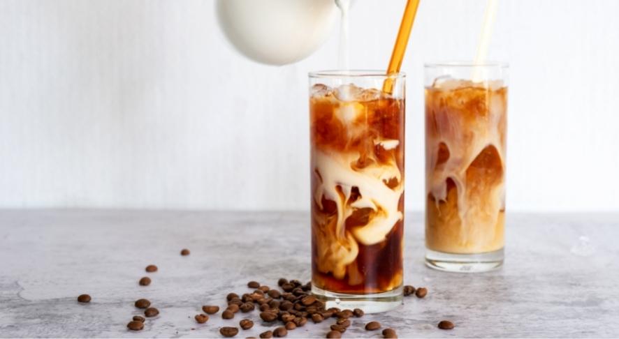 Smith Brothers Farms Milk being poured into Stumptown Cold Brew Concentrate